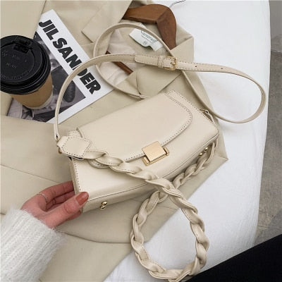 Twist Strap Shoulder Bag
