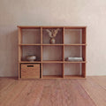 Nine cube bookshelf in red oak