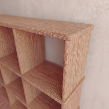Nine cube bookshelf in red oak