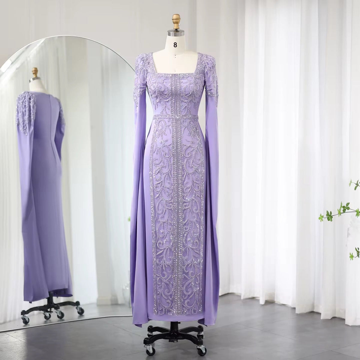 Kaftan style cape sleeves gown