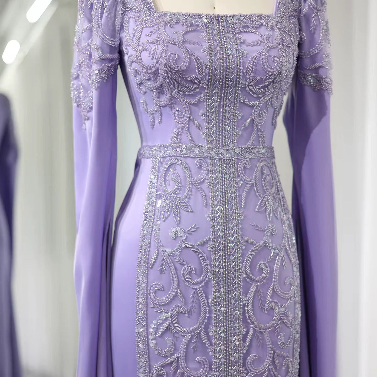 Kaftan style cape sleeves gown