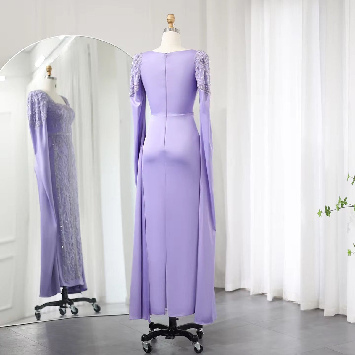 Kaftan style cape sleeves gown