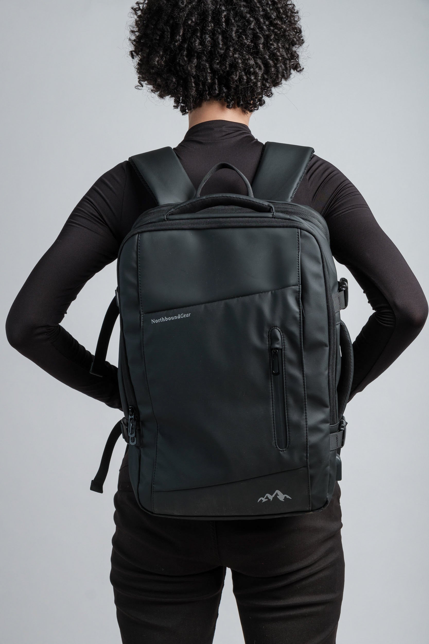 Voyager Expandable Backpack 26L / 38L with Built-in Rain Coat
