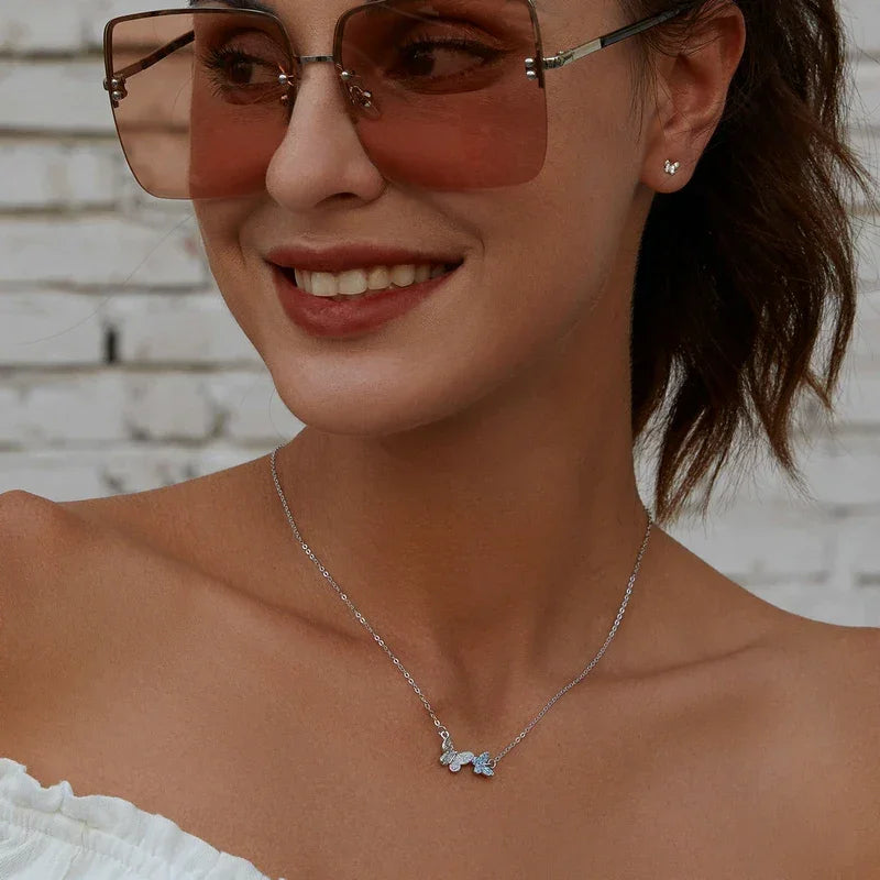 Soar with Style: Blue Zircon Korean Style Sterling Silver Butterfly Necklace