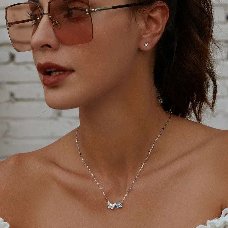 Soar with Style: Blue Zircon Korean Style Sterling Silver Butterfly Necklace