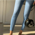Back Rip Ankle Jeans