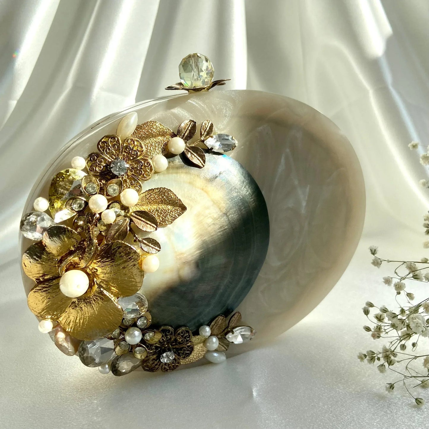 ARIEL Clutch - Products Added