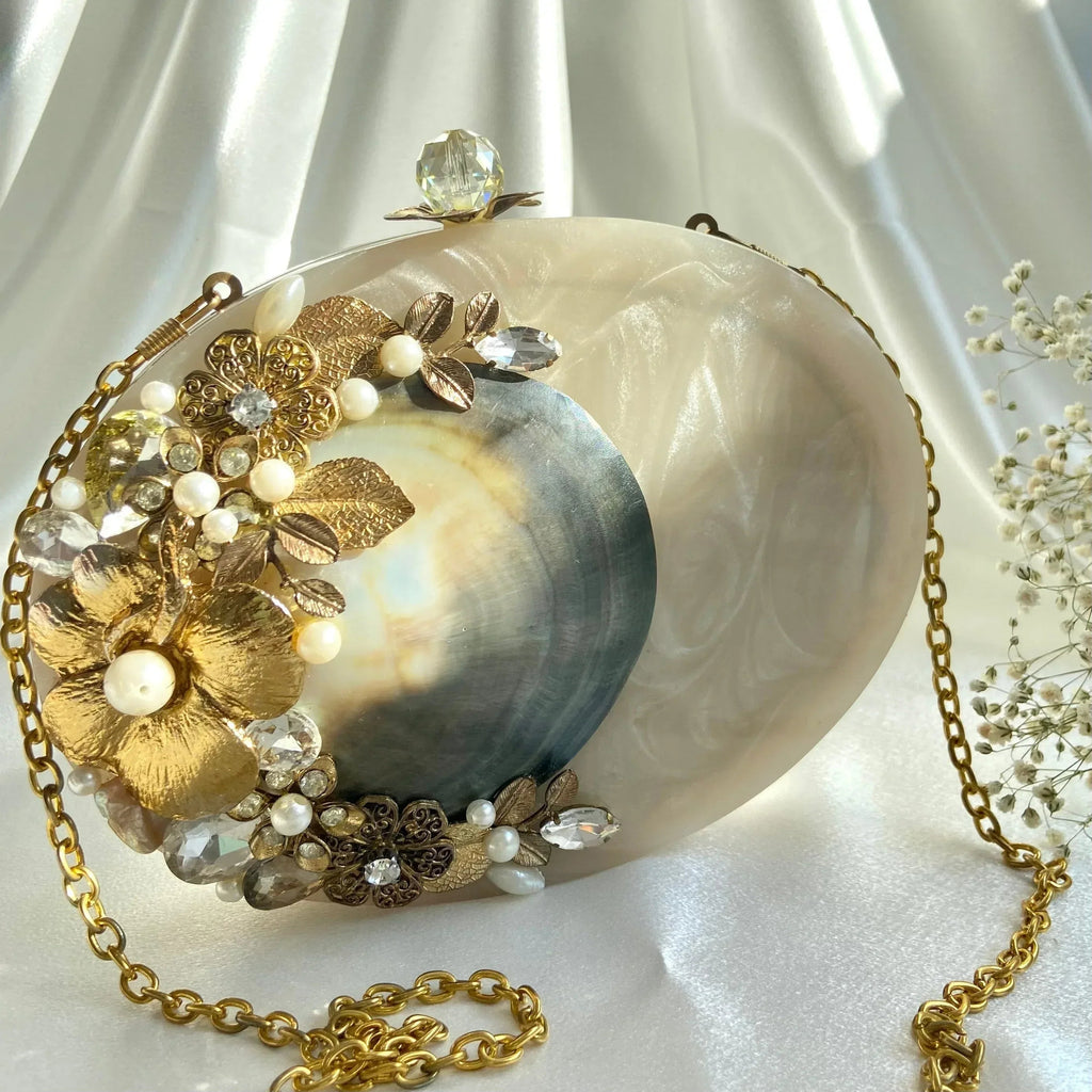ARIEL Clutch - Products Added