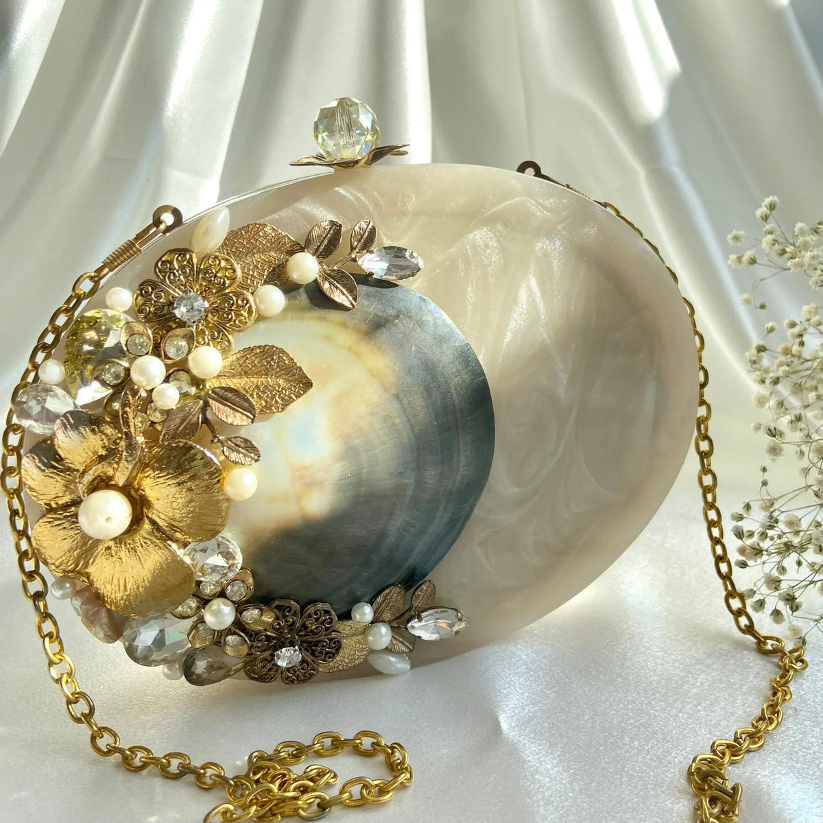 ARIEL Clutch - Products Added
