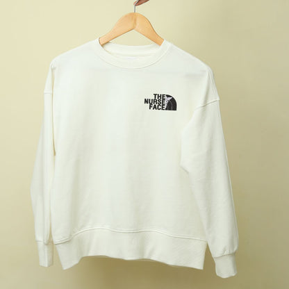 Crewneck "The Nurse Face" brodé