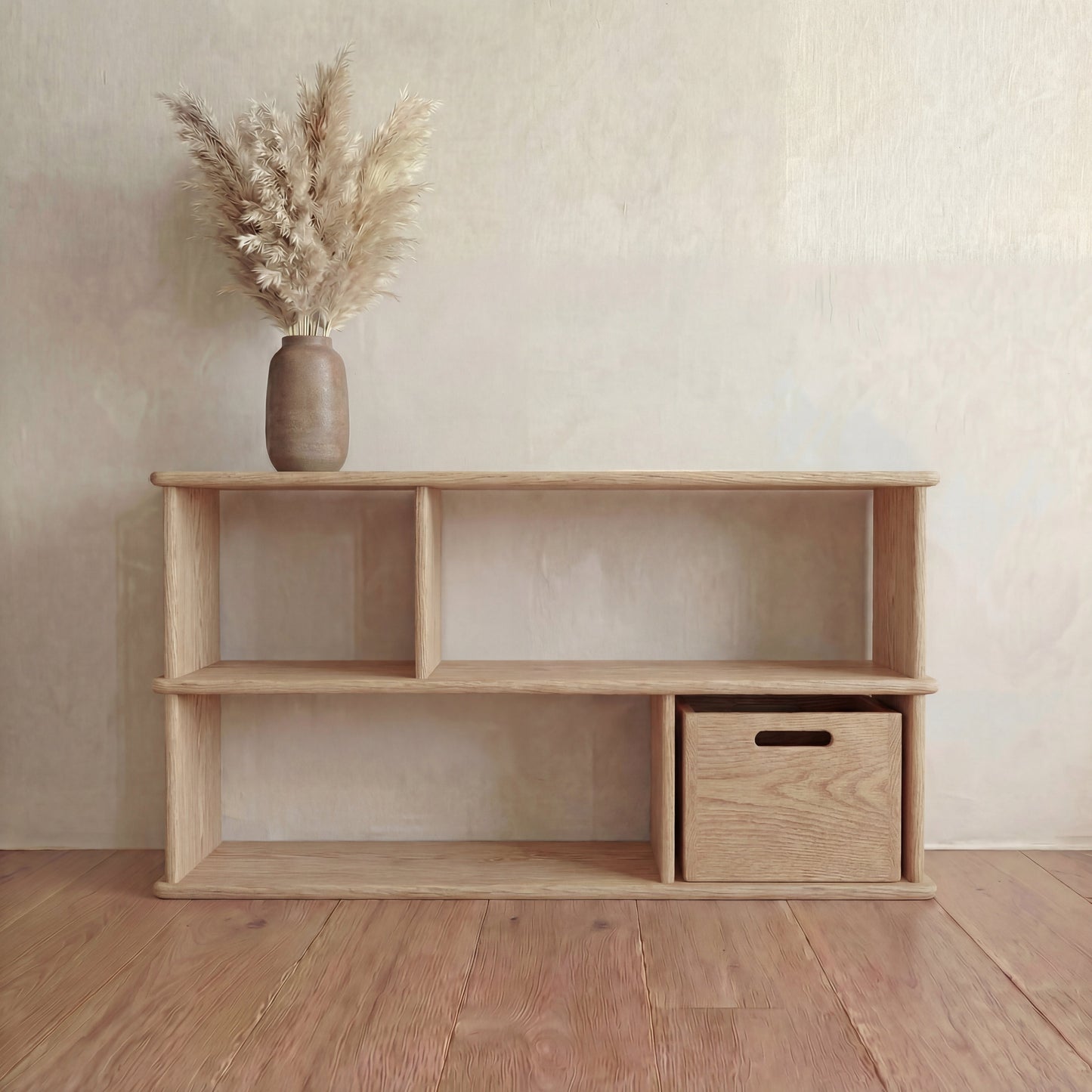Horizontal bookshelf in white oak