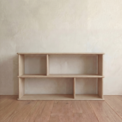 Horizontal bookshelf in white oak