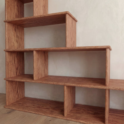Step bookshelf in red oak