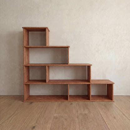 Step bookshelf in red oak