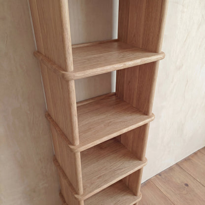 Tall narrow bookcase in white oak