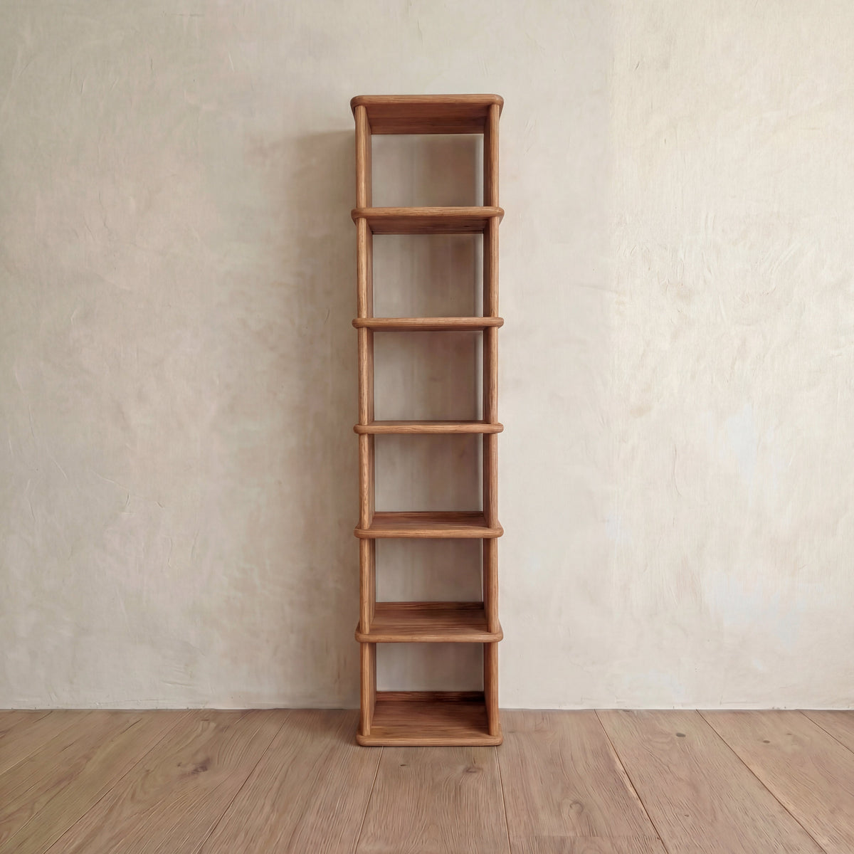 Tall narrow bookcase in red oak