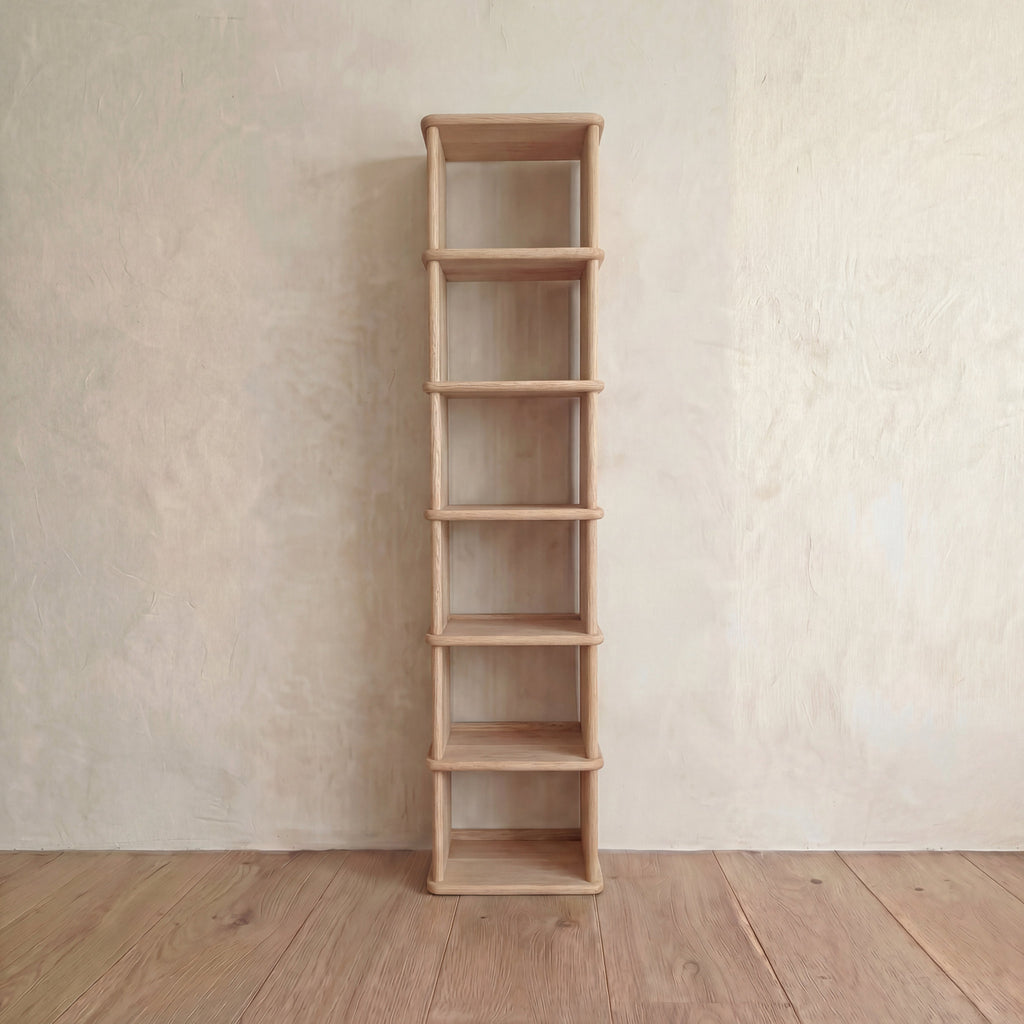 Tall narrow bookcase in white oak
