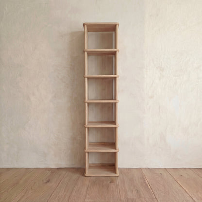 Tall narrow bookcase in white oak