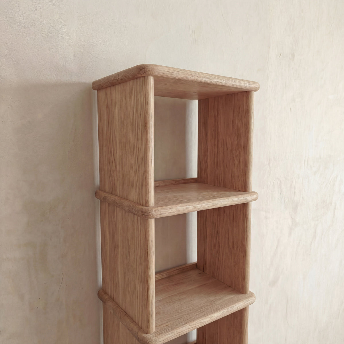 Tall narrow bookcase in white oak