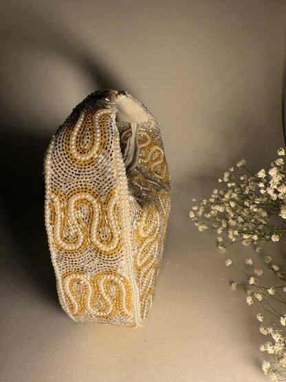 The Ivory Opulence Bag - Products Added