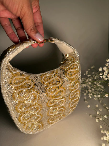 The Ivory Opulence Bag - Products Added