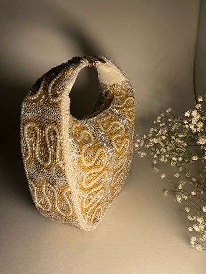 The Ivory Opulence Bag - Products Added