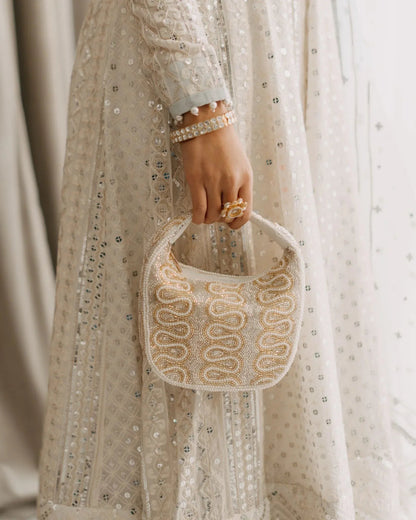 The Ivory Opulence Bag - Products Added