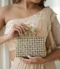 The MERAKI Gold Clutch - Products Added