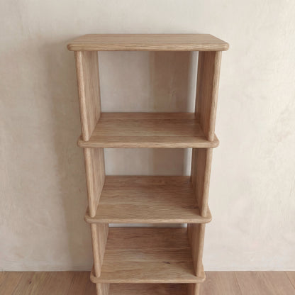 Narrow bookshelf in white oak